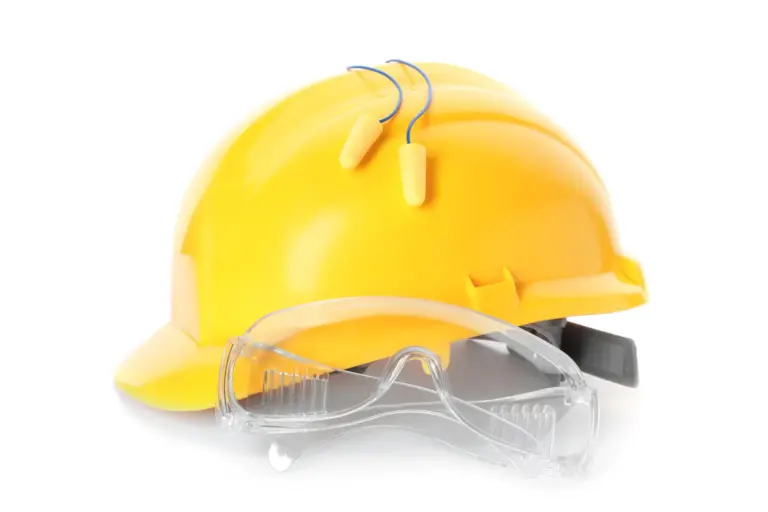 A yellow hard hat and safety glasses